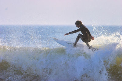 Man surfing in sea