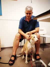 Full length of man with dog