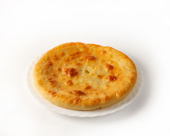 High angle view of bread against white background