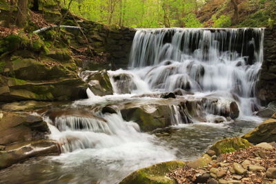 Scenic view of waterfall in forest