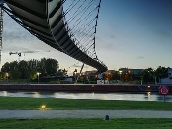 View of bridge in city against sky