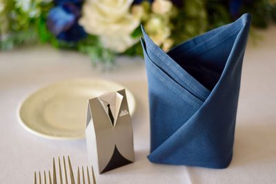 Close-up of place mat on table during wedding