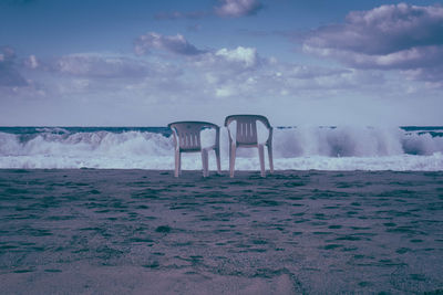 Scenic view of beach against sky