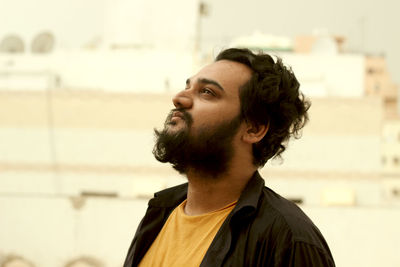 Close-up of young man looking up