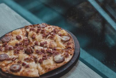 High angle view of pizza on table