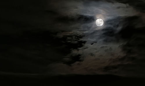 Scenic view of moon against sky at night