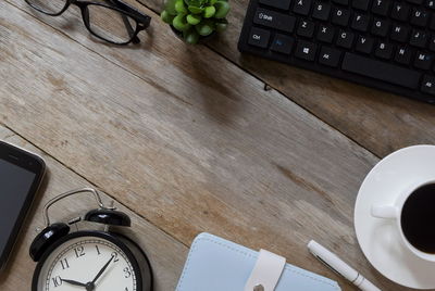 High angle view of coffee cup on table