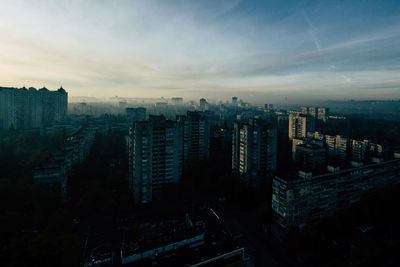 High angle view of buildings in city against sky