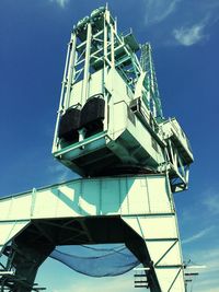 Low angle view of built structure against blue sky