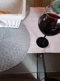 High angle view of wine glass on table