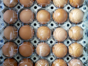 Full frame shot of eggs in container