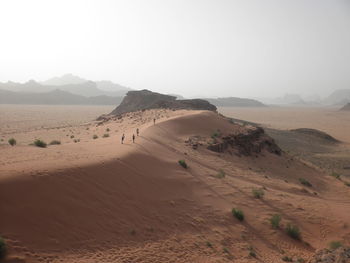 Scenic view of desert against sky