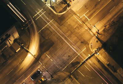 High angle view of illuminated road in city at night