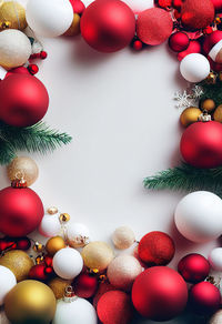 Directly above shot of christmas decorations on white background