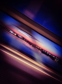 Illuminated lights in airport at night