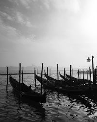 View of boats moored in water