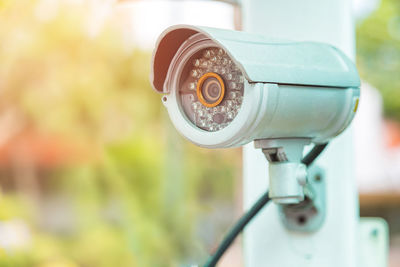 Close-up of coin-operated binoculars against blurred background