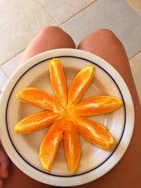 High angle view of orange fruits on table