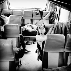 Portrait of people sitting in airplane