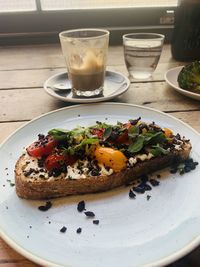 Close-up of breakfast served on table