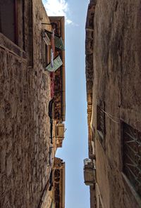 Low angle view of old building against sky