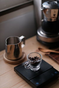 High angle view of coffee cup on table