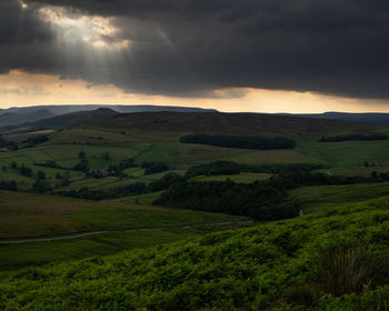 Scenic view of landscape against sky during sunset