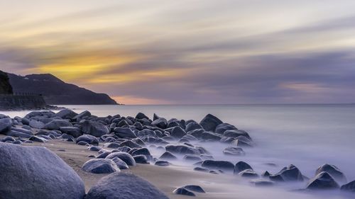 Scenic view of sea against sky during sunset