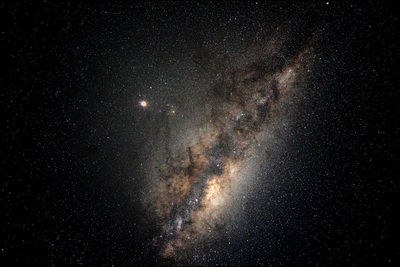 Low angle view of star field against sky at night