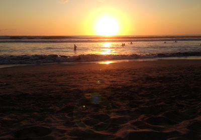 Scenic view of beach during sunset