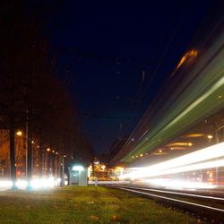 Illuminated street lights at night