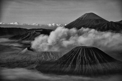 Aerial view of volcano against sky