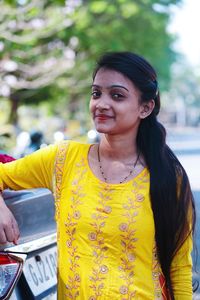 Young indian woman looking at camera