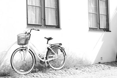 Bicycle parked outside house