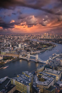 High angle view of bridge over river against sky during sunset