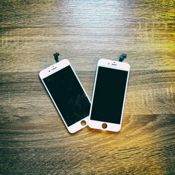 High angle view of mobile phone on table