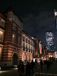 Illuminated buildings in city at night