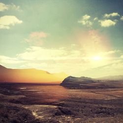 Scenic view of mountains at sunset
