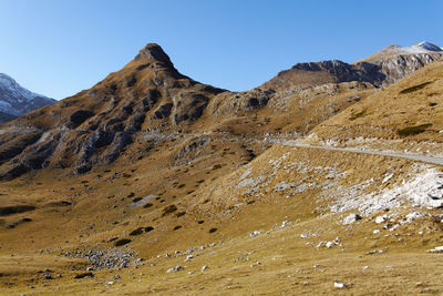 Scenic view of rocky mountains against clear sky