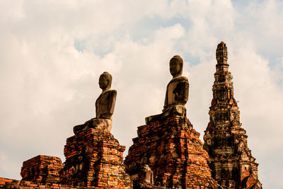 Low angle view of old building in ayutthaya province under the blue sky