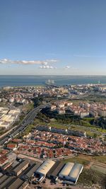 High angle view of buildings in city against sky