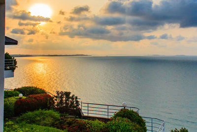 Scenic view of sea against sky at sunset