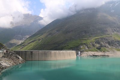 Scenic view of dam and mountains