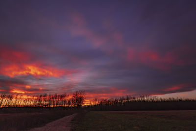 Scenic view of dramatic sky during sunset