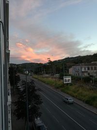 High angle view of empty road along buildings