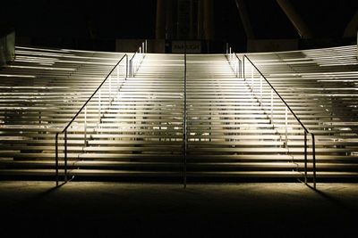 Low angle view of illuminated staircase at night