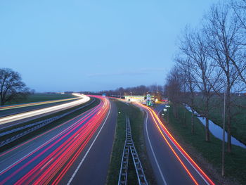 High angle view of vehicle light trails on highway