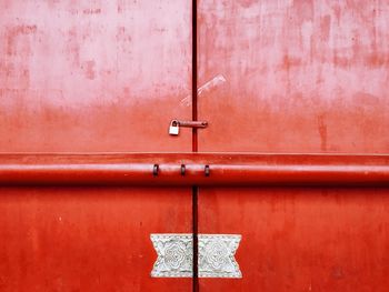 Close-up of closed red door