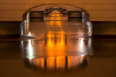 Bridge on sea during sunset