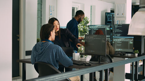 Business colleagues working in office